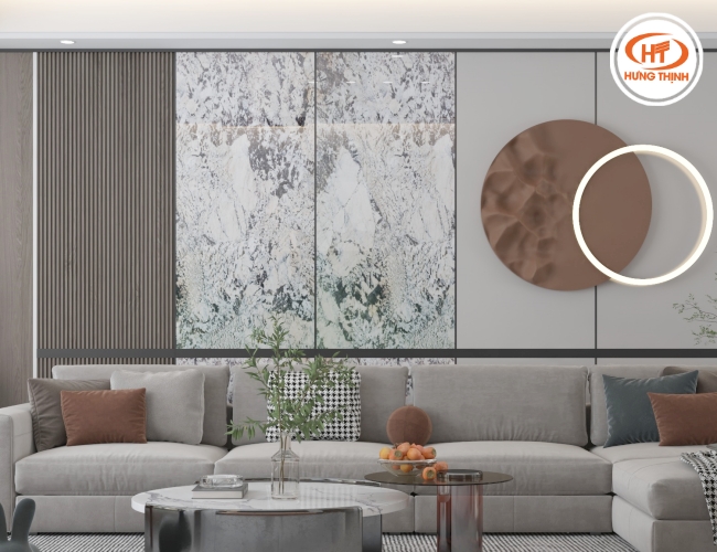 Tường được ốp bằng đá Granite tạo điểm thu hút cho phòng khách