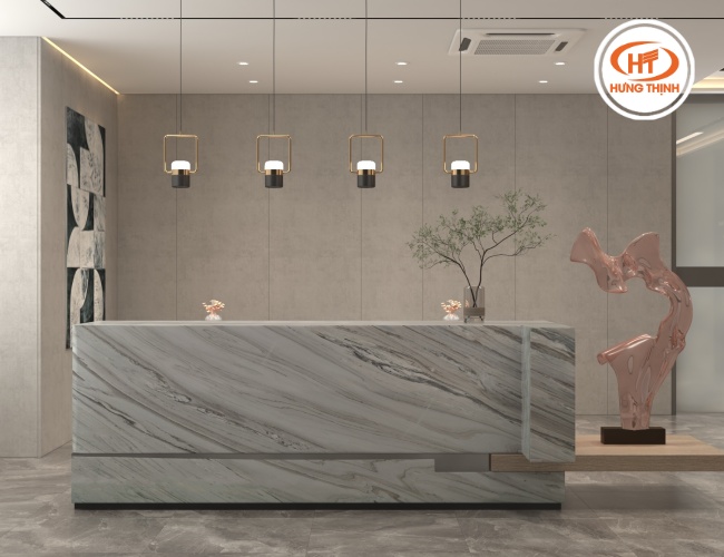 Quầy tiếp tân sảnh chờ được ốp bằng đá Granite Bruno White tạo điểm nhấn cho không gian