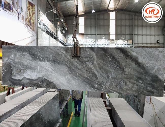 Đá nung kết xám vân đẹp ốp thang máy.