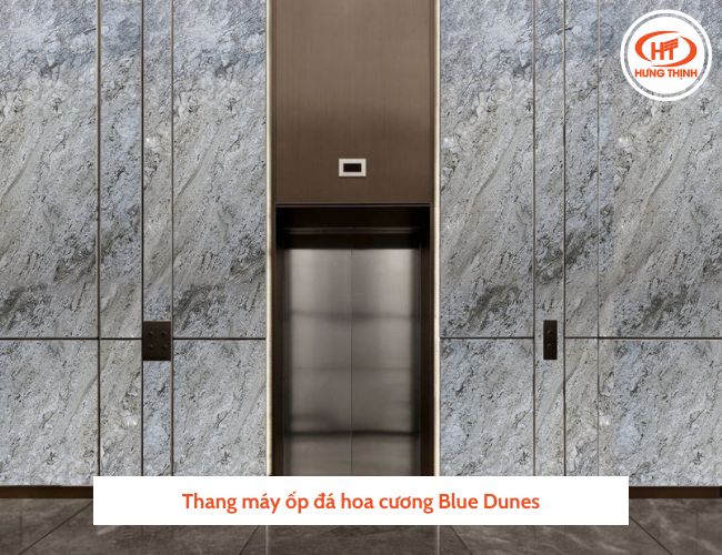 Hình ảnh cửa thang máy ốp đá Blue Dunes ấn tượng.