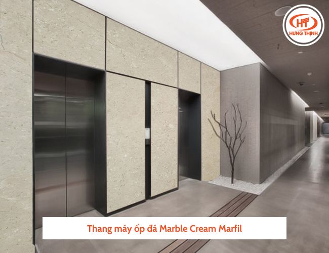 Mặt thang máy ốp đá Cẩm Thạch Cream Marfil sang trọng, tinh tế.