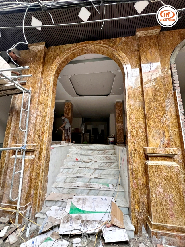 Thi công công trình đá ốp mặt tiền màu vàng hoàng gia tại Hà Nội