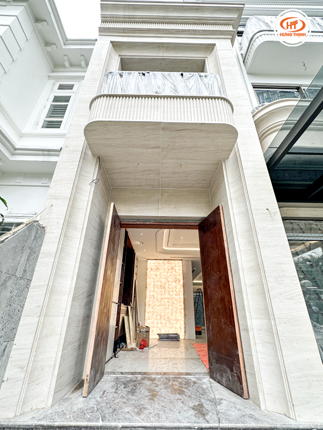 Màu sắc nhẹ nhàng nhưng cũng không kém phần sang trọng của đá ốp mặt tiền màu vàng Marble Moca Crema