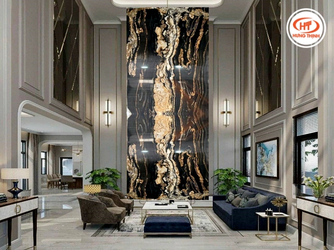 Ứng dụng đá Granite làm tranh đá thông tầng phòng khách. 