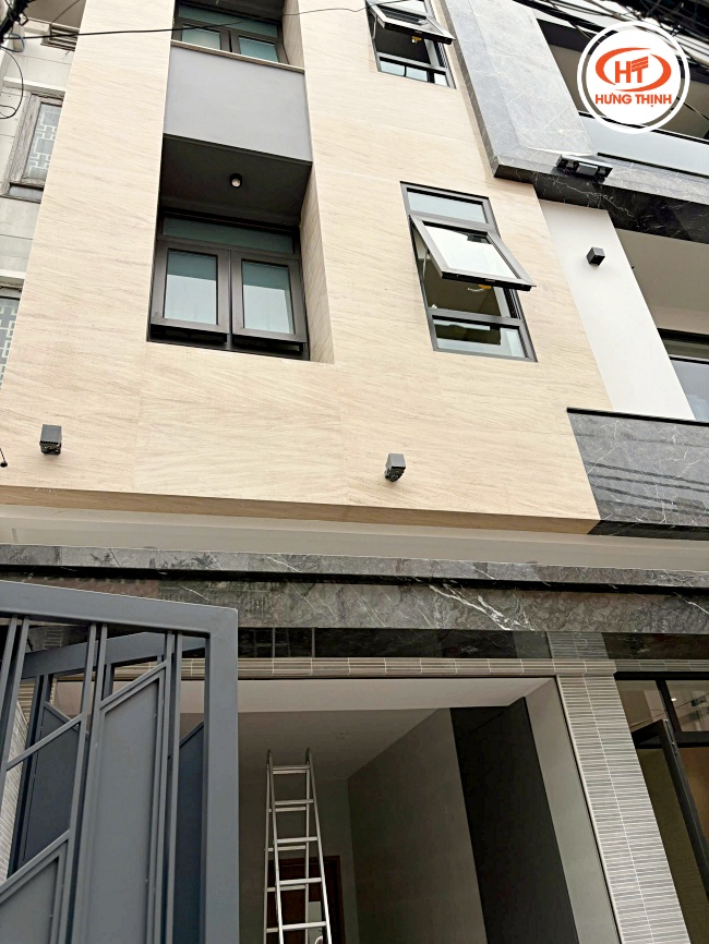 Không gian mặt tiền ốp đá Marble Vân Gỗ Cát