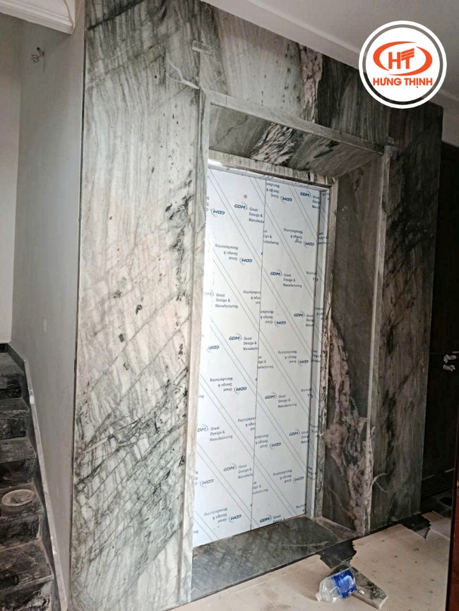 Ốp đá Thạch Anh Angel Wings cho mặt thang máy