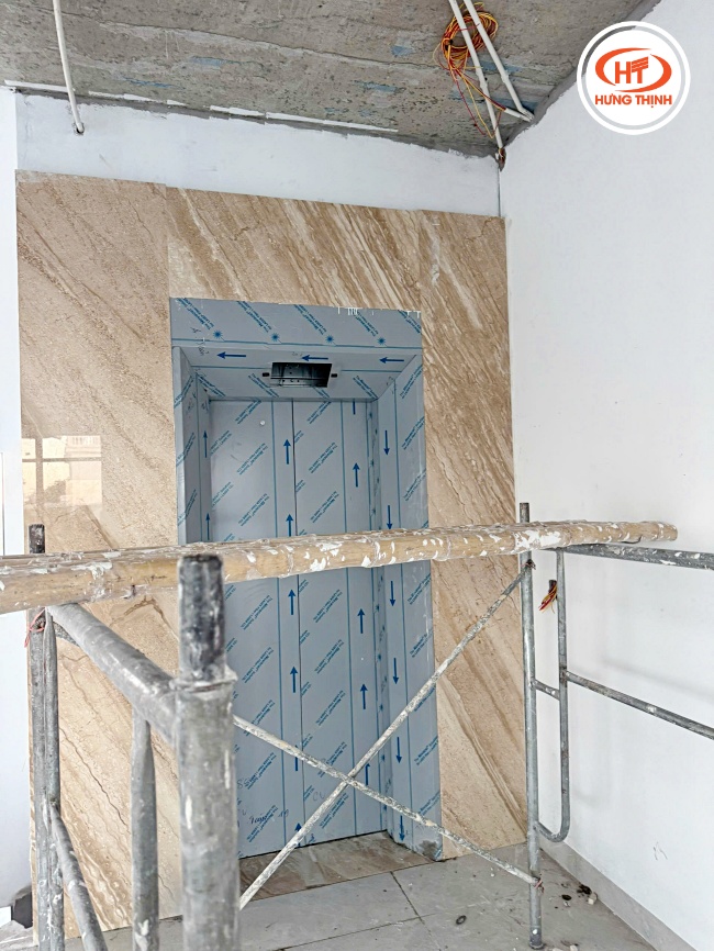 Thi công đá ốp thang máy Marble Vân Gỗ Chéo