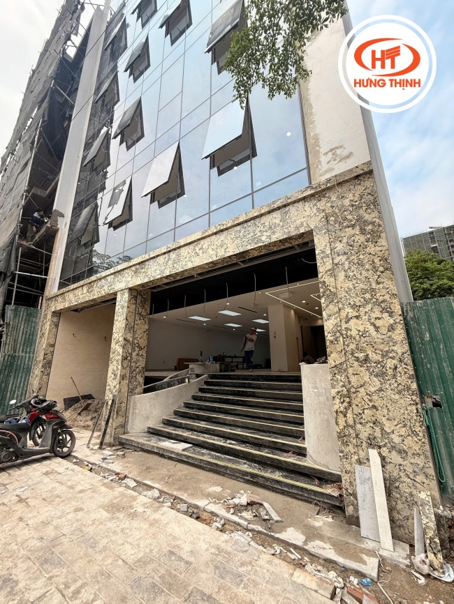 Hình ảnh thi công mặt tiền đá Granite Blue Persa