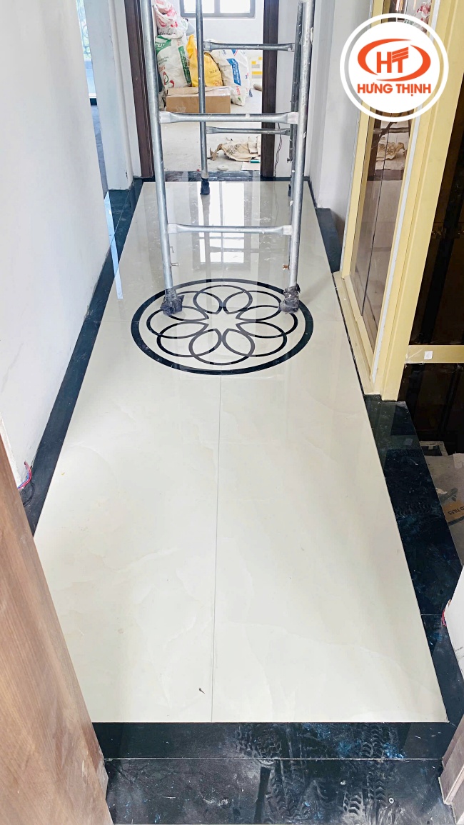 Thi công lát sàn đá nung kết Crema Onyx