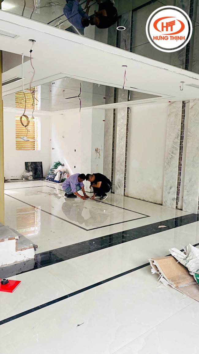 Nghiệm thu sàn sau ốp đá nung kết Crema Onyx