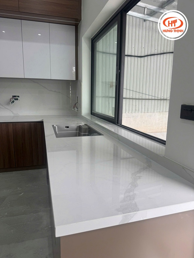 Thi công lắp đặt đá bàn bếp Nung Kết Suite Carrara cho gia chủ